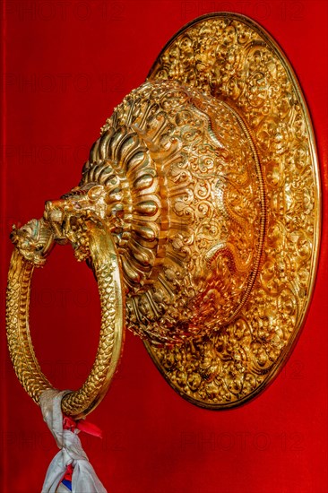 Lion shaped door handle in Buddhist temple. Kaza Monastery