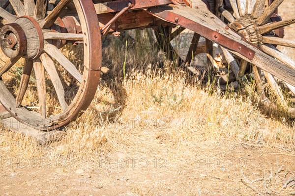 Abstract of vintage antique wood wagons and wheels