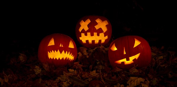 Glowing pumpkins at night