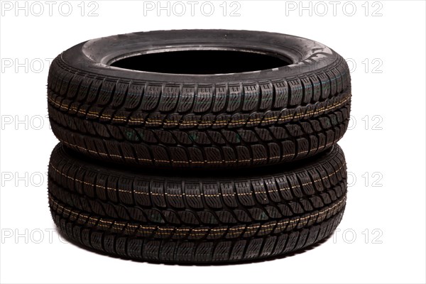 Two car tires isolated on white background