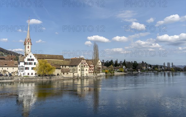 Picturesque view of the half-timbered houses and the town church on the banks of the Rhine