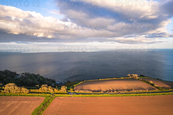 Devon Fields and Farmlands at sunset time from a drone over Labrador Bay