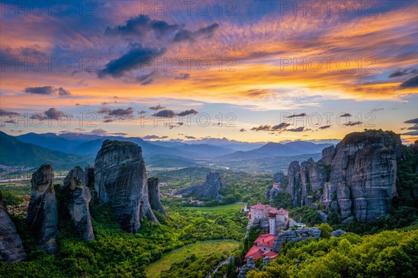 Monastery of Rousanou and Monastery of St. Nicholas Anapavsa in famous greek tourist destination Meteora in Greece on sunset