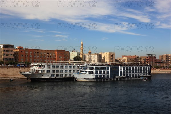 Cruise ships at the landing stage on the Nile near the town of Esna