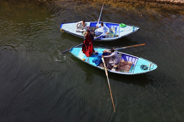 Souvenir seller with a rowing boat on the Nile