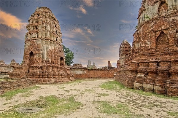 Weathered pagodas in the early morning at Wat Mahathat temple