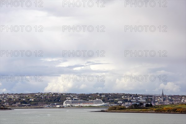 Ocean liner MSC Magnifica having docked at Cobh Harbour in Ireland on a brilliant sunny day. Cobh