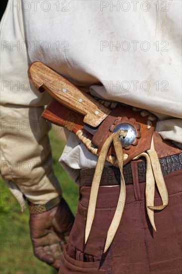 Farmer carrying machete