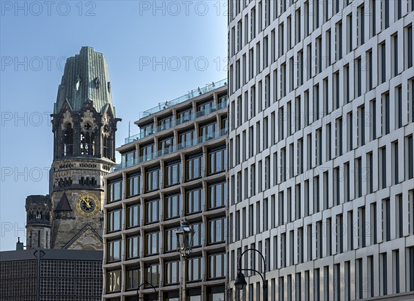 Kaiser Wilhelm Memorial Church with the facade of the Upper West high-rise