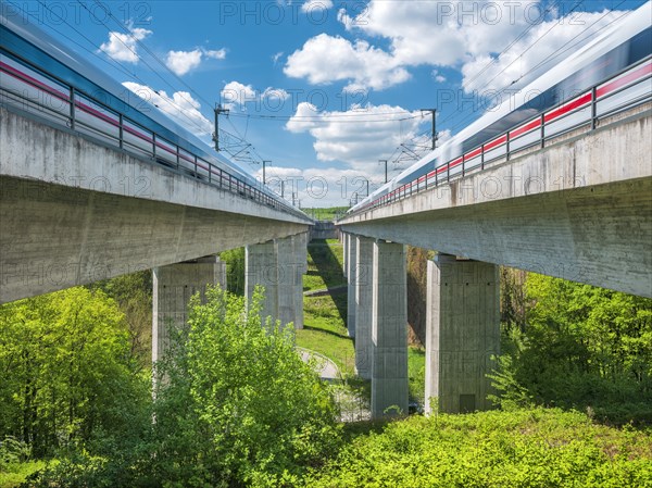 ICE trains pass the Saubachtal bridge