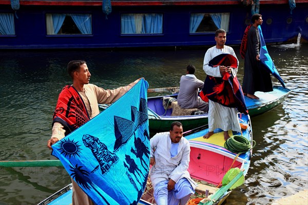 Souvenir seller with a rowing boat on the Nile