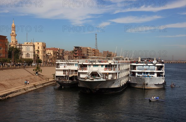 Cruise ships at the landing stage on the Nile near the town of Esna