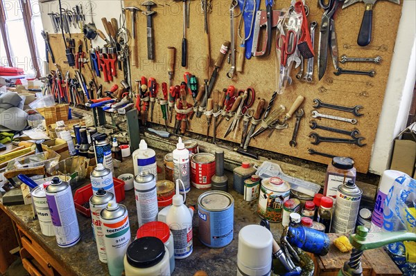 Tools and spray cans in a saddlery in Allgaeu