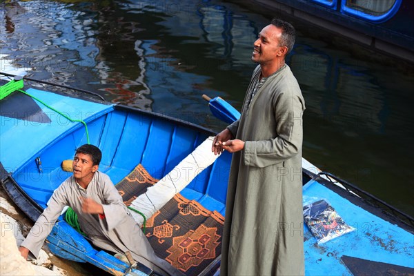 Souvenir seller with a rowing boat on the Nile