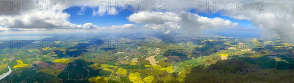 Panoramic view from a glider between the Baltic Sea and Lake Ploen. On the left the plane surface and Lake Ploen