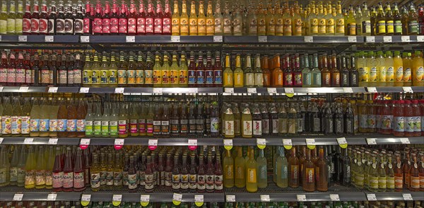 Shelves with non-alcoholic drinks in an organic supermarket