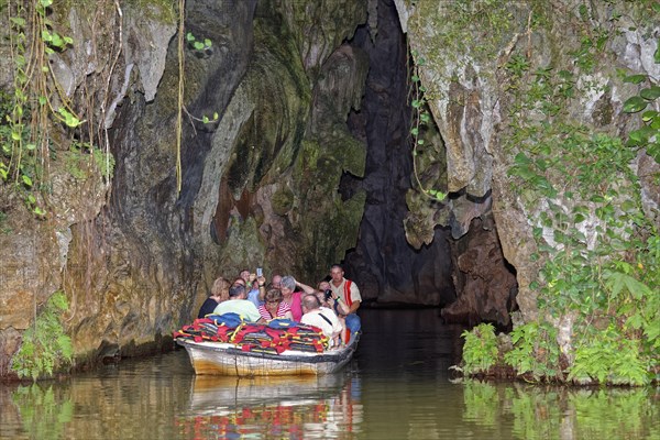 Tourists ride on stream