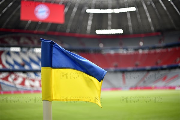 Corner flag in Ukrainian national colours as a sign against the war Russia versus Ukraine