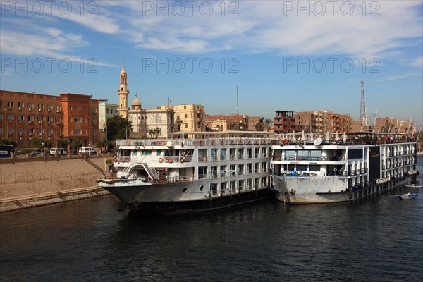 Cruise ships at the landing stage on the Nile near the town of Esna