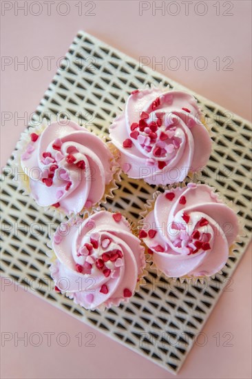 Four creamy cupcakes