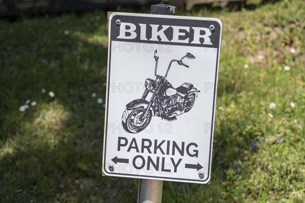 Sign at a car park for bikers