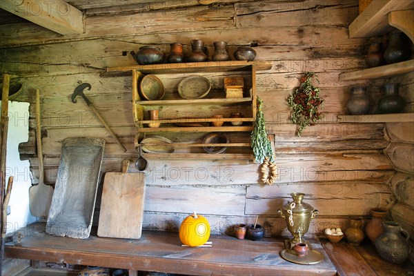 Kitchen utensils in the interior of the Museum of Wooden Architecture