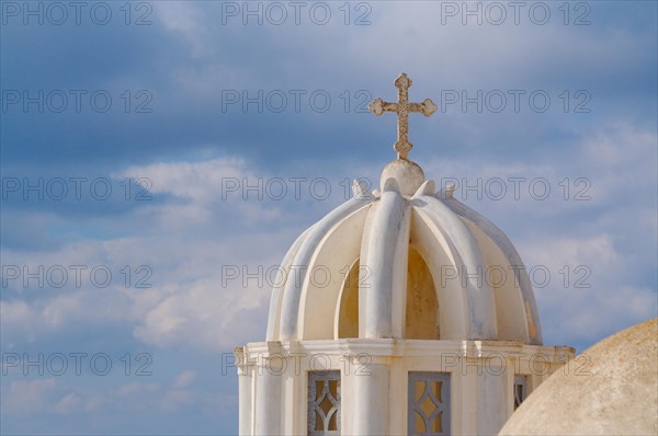 Close-up of dome and cross from santorini