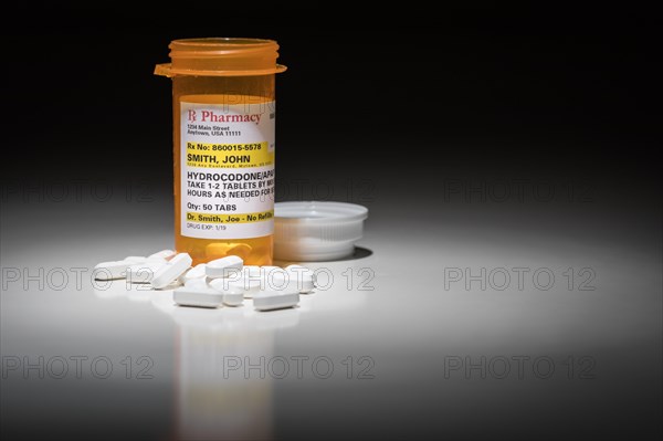 Hydrocodone pills and prescription bottle with non proprietary label. no model release required