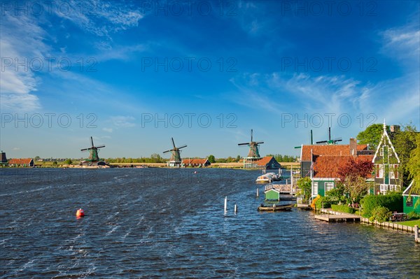 Netherlands rural landscape Windmills at famous tourist site Zaanse Schans in Holland. Zaandam