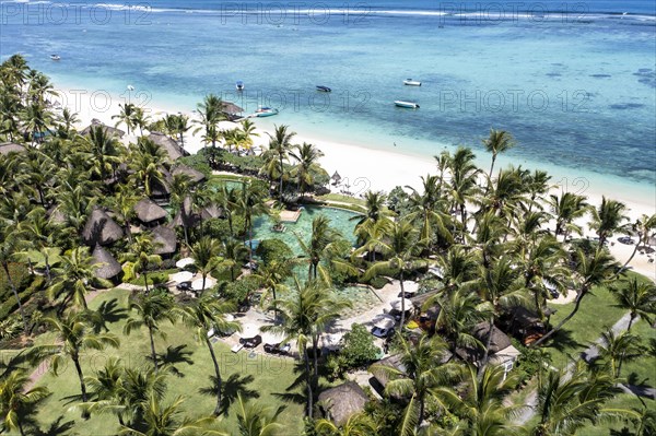 Aerial view The beach of Flic en Flac with luxury hotel and palm trees