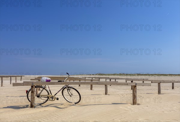 Beach with wooden planks and guard house