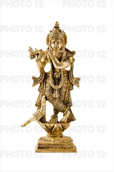 Krishna god Vishnu avatar brass statue isolated on white with reflection