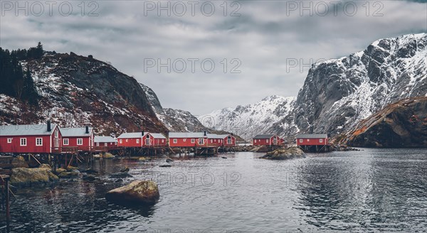 Nusfjord authentic fishing village with traditional red rorbu houses in winter. Lofoten islands