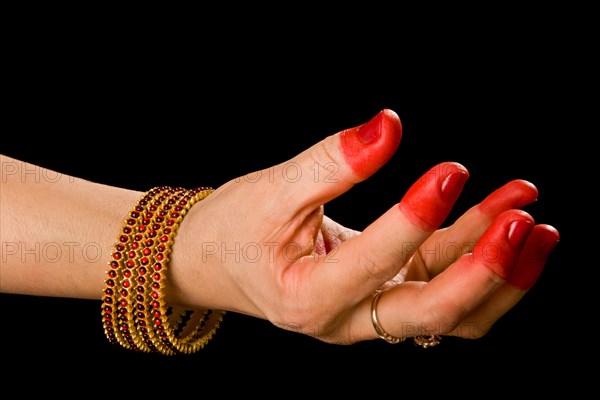 Woman hand showing Samdamsha hasta