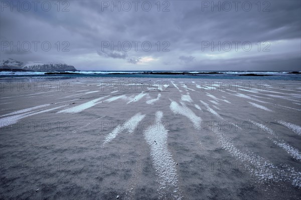 Rocky coast of fjord of Norwegian sea in winter. Skagsanden beach