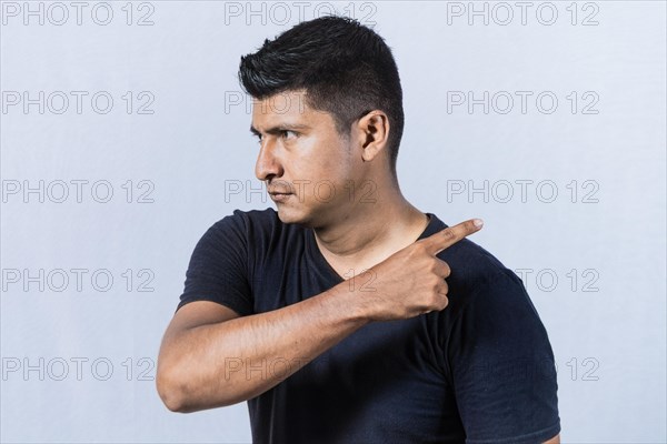 Angry person pointing to get out