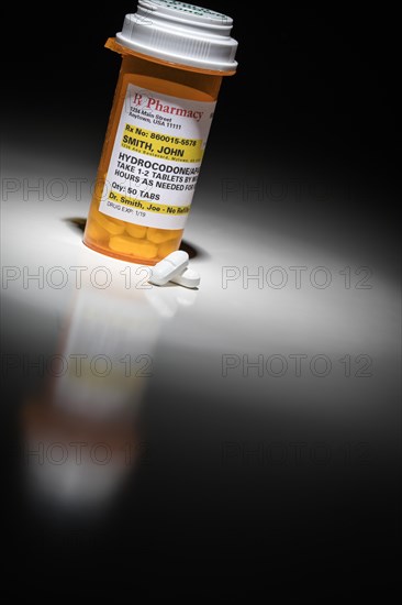 Hydrocodone pills and prescription bottle with non proprietary label. no model release required