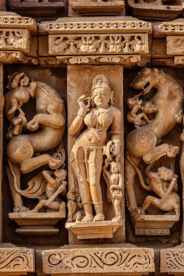 Stone carving bas relief sculptures on Adinath Jain Temple