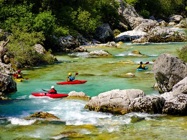 Kayakers on the emerald green Soca River