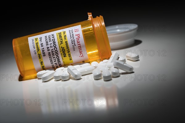 Hydrocodone pills and prescription bottle with non proprietary label. no model release required