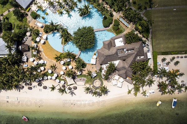 Aerial view The beach of Flic en Flac with luxury hotel Sugar Beach Resort & Spa and palm trees