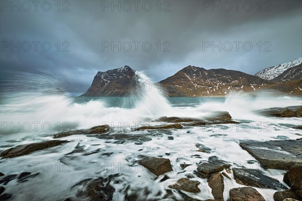 Rocky coast of fjord of Norwegian sea in winter. Lofoten islands