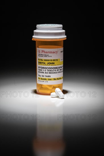 Hydrocodone pills and prescription bottle with non proprietary label. no model release required