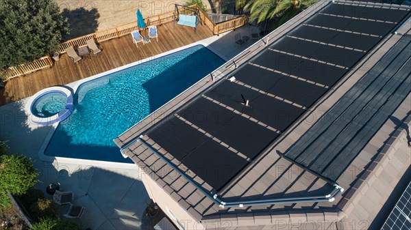 Thermal solar panels installed on the roof of a large house