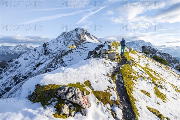 Young female hiker on hiking trail to Kramerspitz