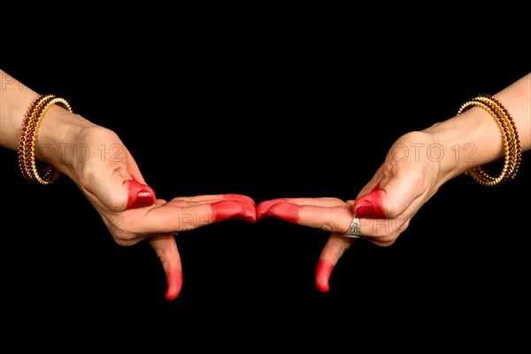 Woman hand showing Khatwa hasta of indian classic dance Bharata Natyam