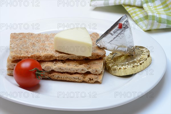 Schmelzkaese auf Knaeckebrot