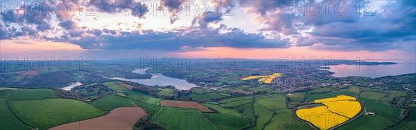 Sunset over Devon Fields and Farmlands from a drone