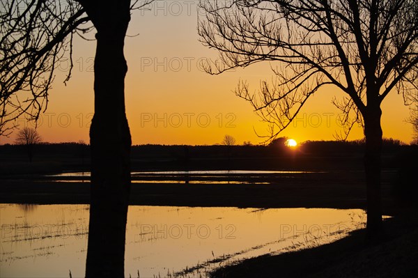 Sunset above a floated meadow