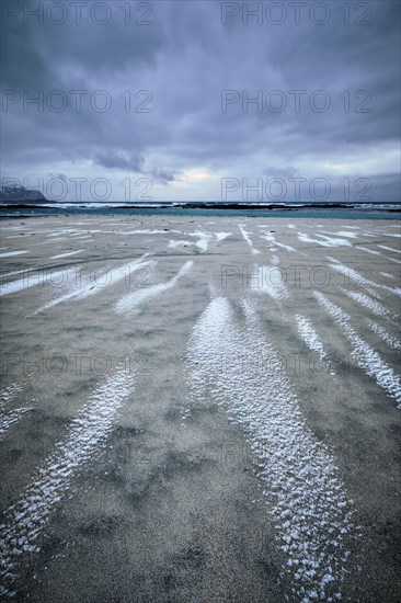 Rocky coast of fjord of Norwegian sea in winter. Skagsanden beach